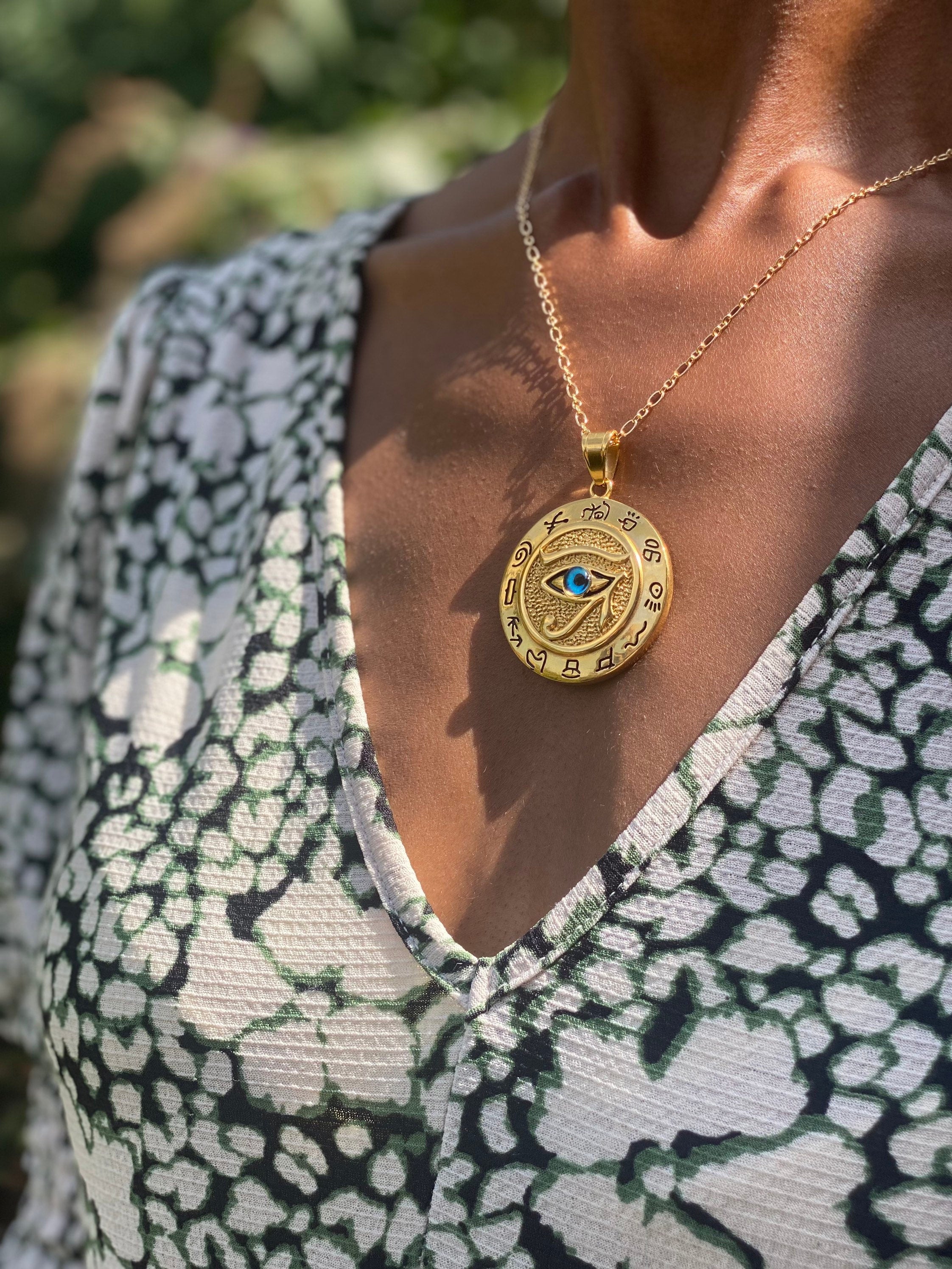 Eye of sale ra gold pendant